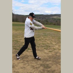Rodger Martin swinging a baseball bat